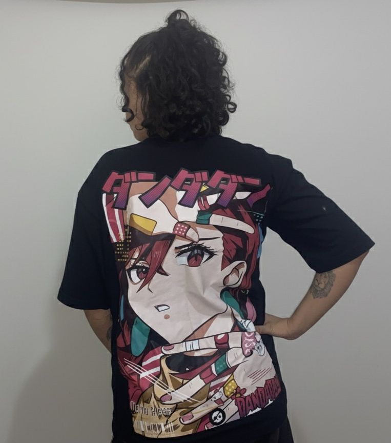 Camiseta Oversized: Momo - Dualidade Paranormal